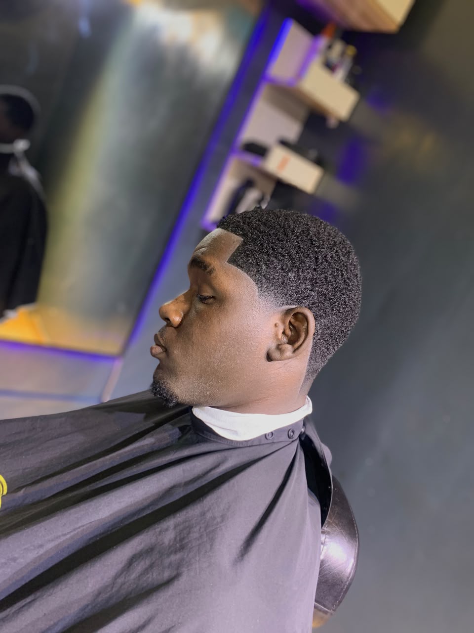 Short textured haircut with a defined hairline